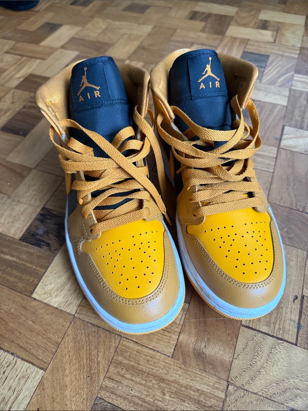 Jordan woman’s High-Top Sneakers in Yellow and Tan